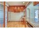 Kitchen with wood cabinets and granite countertops at 485 Garrison St, Lakewood, CO 80226