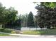 Well-maintained tennis court with surrounding fence, perfect for recreation at 13890 E Marina Dr # 612, Aurora, CO 80014