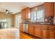 Eat in kitchen with modern appliances and wood cabinets at 110 Lucerne Dr, Lafayette, CO 80026