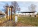 Park entrance with sign, shelter, and playground visible at 110 Lucerne Dr, Lafayette, CO 80026