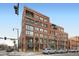 Brick building with multiple windows and commercial spaces on the ground floor at 1499 Blake St # 1A & 1B, Denver, CO 80202