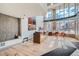 Bright lobby with modern furniture, high ceilings, and large windows at 1499 Blake St # 1A & 1B, Denver, CO 80202