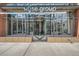 Modern building entrance with glass doors and the Wyse Group logo at 1499 Blake St # 1A & 1B, Denver, CO 80202