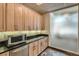 Simple office kitchen with microwave and cabinets at 1499 Blake St # 1A & 1B, Denver, CO 80202