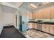 Modern office kitchen with stainless steel appliances at 1499 Blake St # 1A & 1B, Denver, CO 80202
