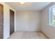 Simple bedroom with carpet, neutral walls, and a window at 425 Crystal Pl, Longmont, CO 80504