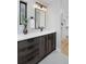 Stylish bathroom with contemporary vanity and large mirror at 3916 N Raleigh St, Denver, CO 80212