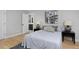 Spacious bedroom with ensuite bathroom access at 3916 N Raleigh St, Denver, CO 80212
