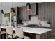 Close-up of the kitchen counter, backsplash, and range at 3916 N Raleigh St, Denver, CO 80212
