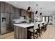 Modern kitchen with stainless steel appliances, white countertops, and an island at 3916 N Raleigh St, Denver, CO 80212