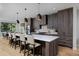 View of the kitchen island, cabinets, and appliances at 3916 N Raleigh St, Denver, CO 80212