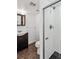 Basement bathroom with shower, vanity, and toilet at 8060 E Girard Ave # 419, Denver, CO 80231
