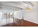 Bright living room with hardwood floors and balcony view at 8060 E Girard Ave # 419, Denver, CO 80231