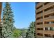 Balcony view of mountain range and trees at 8060 E Girard Ave # 419, Denver, CO 80231