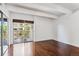 Bright bedroom with hardwood floors and access to private balcony at 8060 E Girard Ave # 419, Denver, CO 80231
