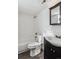 Updated bathroom, includes a tub, toilet and dark vanity at 8060 E Girard Ave # 419, Denver, CO 80231