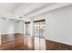 Well-lit bedroom featuring mirrored closet and hardwood floors at 8060 E Girard Ave # 419, Denver, CO 80231