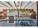 Community pool with surrounding patio at 8060 E Girard Ave # 419, Denver, CO 80231