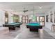 Game room with two billiard tables at 8060 E Girard Ave # 419, Denver, CO 80231