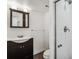 Basement bathroom with shower, vanity, and toilet at 8060 E Girard Ave # 419, Denver, CO 80231