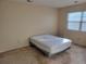 Simple bedroom with a double bed and window coverings at 7031 S Knolls Way, Centennial, CO 80122