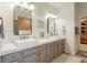 Elegant bathroom with dual vanities, quartz countertops, and modern fixtures at 52 Toppler Ct, Castle Pines, CO 80108