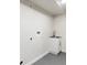 Basement laundry room with sink and utility hookups at 210 E Graves Ave, Centennial, CO 80121