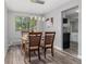 Bright dining area with four chairs and kitchen view at 6509 S Yukon St, Littleton, CO 80123