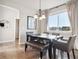 Bright dining room with large window and bench seating at 12535 Valentia St, Brighton, CO 80602