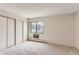 Spacious bedroom with double closets and window at 13890 E Marina Dr # 111, Aurora, CO 80014