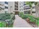 Building exterior with manicured landscaping and walkway at 13890 E Marina Dr # 111, Aurora, CO 80014