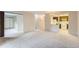 Open concept living room with kitchen and bedroom views at 13890 E Marina Dr # 111, Aurora, CO 80014
