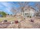 Landscaped backyard with gravel and plants at 1555 Rosedale St, Castle Rock, CO 80104