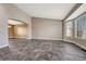 Bright living room with tile floors and bay windows at 1555 Rosedale St, Castle Rock, CO 80104