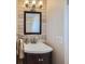 Updated bathroom with vanity, tile, and a large mirror at 1761 S Estes, Lakewood, CO 80232