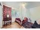 Cozy bedroom featuring a canopy bed and hardwood floors at 1761 S Estes, Lakewood, CO 80232