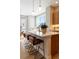 Kitchen island with seating and a stylish modern faucet at 2865 S Pancratia St, Denver, CO 80236