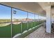 Relaxing balcony offering city views and bird feeder at 1155 N Ash St # 1504, Denver, CO 80220