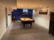 Finished basement with a pool table and blue walls at 542 E Caley Dr, Centennial, CO 80121