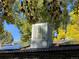 Swamp cooler on roof with solar panels at 542 E Caley Dr, Centennial, CO 80121