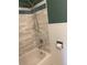 Clean bathroom with a tub and shower combination at 542 E Caley Dr, Centennial, CO 80121