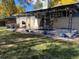 Backyard patio with hot tub and seating area at 542 E Caley Dr, Centennial, CO 80121