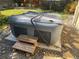 Covered hot tub with steps and surrounding gravel at 542 E Caley Dr, Centennial, CO 80121
