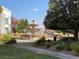 Community fountain with benches and landscaping at 542 E Caley Dr, Centennial, CO 80121