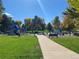 Park with playground equipment and walking path at 542 E Caley Dr, Centennial, CO 80121