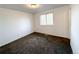 Spacious bedroom with wall-to-wall carpeting and ample natural light at 2888 S Olathe Way, Aurora, CO 80013