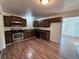 Updated kitchen with stainless steel appliances and light wood cabinets at 2888 S Olathe Way, Aurora, CO 80013