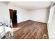 Bright living room featuring hardwood floors and ample natural light at 2888 S Olathe Way, Aurora, CO 80013