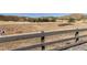 Open space with mountain views beyond a wooden fence at 515 Felicity Loop, Castle Rock, CO 80109