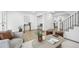 Light-filled living room with hardwood floors and stylish furniture at 11830 E Canal Dr, Aurora, CO 80011